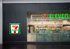 7‑Eleven GUTS 645 Stores Exterior view of a 7-Eleven convenience store with All Cafe signage