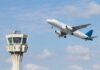 Fumes Force Mid-Atlantic Airline Detour An airplane taking off near an airport control tower