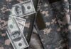 Cash placed inside a military uniform pocket