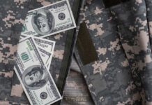 Cash placed inside a military uniform pocket