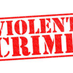 5 Dead; 2 Injured; Targeted Killings Stun U.S. Red stamp with the words VIOLENT CRIME