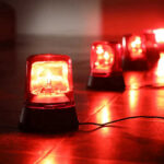 VIDEO: Grand Canyon DELUGE — Dozens Vanish Red emergency lights on dark floor, illuminating the area.