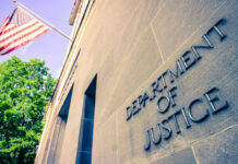 Vandal Hits WWII Memorial — DOJ Drops Hammer Department of Justice building with American flag.