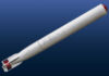 A missile displayed against a blue background