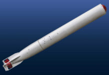 A missile displayed against a blue background