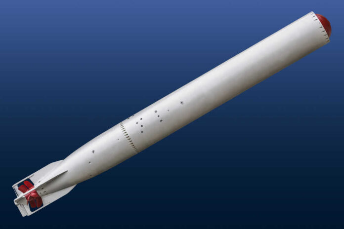 Photograph,Of,Old,Trophy,Defused,Torpedo,Tg-53.,The,Image,Is A missile displayed against a blue background