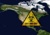 North America map with biohazard warning triangle overlay