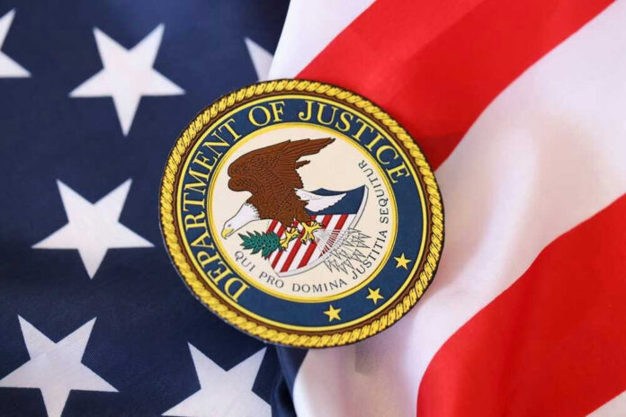Department of Justice seal on American flag.