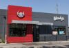 Exterior view of a Wendy's restaurant featuring a delivery pickup area