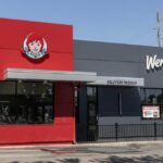 Exterior view of a Wendy's restaurant featuring a delivery pickup area