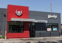Exterior view of a Wendy's restaurant featuring a delivery pickup area
