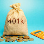 Money bag labeled 401k with coins and an orange calculator