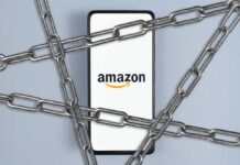 Smartphone with e-commerce logo wrapped in metal chains