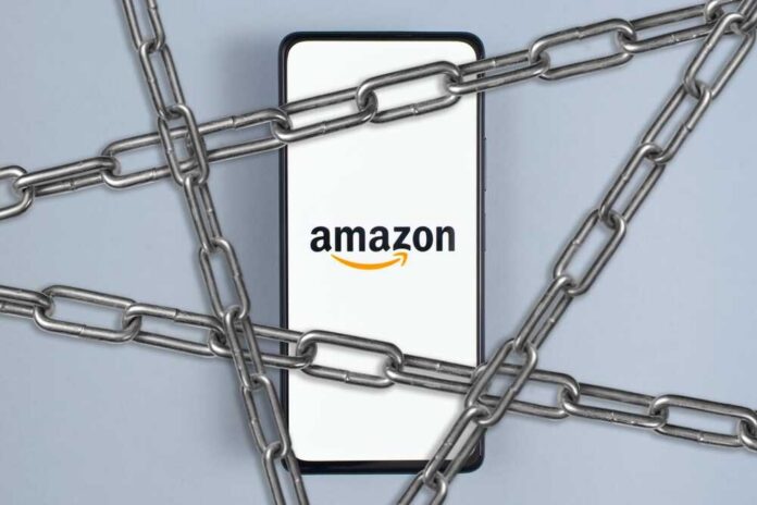 Smartphone with e-commerce logo wrapped in metal chains