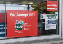 SNAP Cliff Looms – Clock Hits Zero Store window displays EBT and SNAP acceptance signs