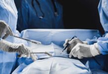 Miraculous 25-Hour Surgery – Both Survived! Surgeons performing a procedure in an operating room
