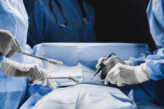 Close,Up,Of,Surgical,Equipment,Used,During,The,Operation.,Medical Surgeons performing a procedure in an operating room