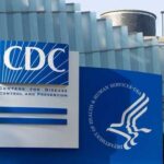 Rapid Rise — Or Recount Fudge? Signage of the CDC building displaying its name and logo
