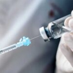 Troop Hormones Tied to Readiness? A healthcare professional preparing a syringe from a vial