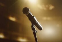 Music Earthquake: Pop Star Dethroned (VIDEO) Close-up of a microphone on a stage with soft lighting