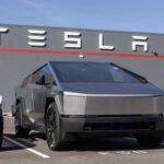 Tesla Trunk Murder Sparks Death Push Tesla Cybertruck parked in front of a Tesla dealership