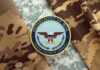 VIDEO: Pentagon Pulls Plug After 12 Years Department of War insignia on camouflage fabric