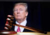 Judge Slams Brakes – Trump Doubles Down Donald Trump behind a judge’s gavel on a wooden surface