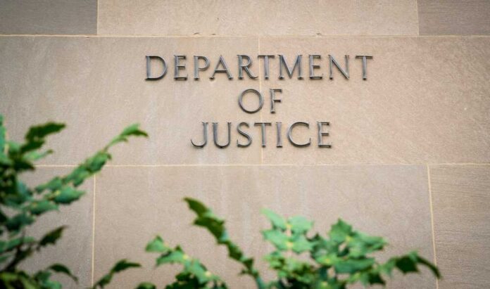 Department of Justice building wall with engraved lettering